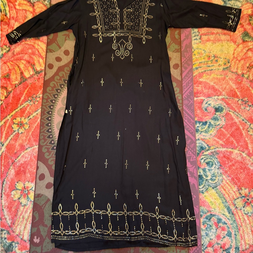 Elegant bedazzled black women’s kirtan from India